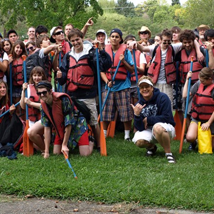 young group being silly before taking on the russian river