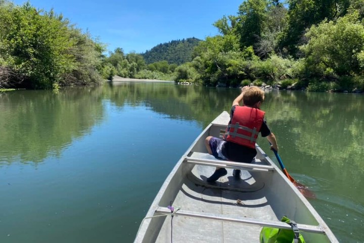 a small boat in a body of water
